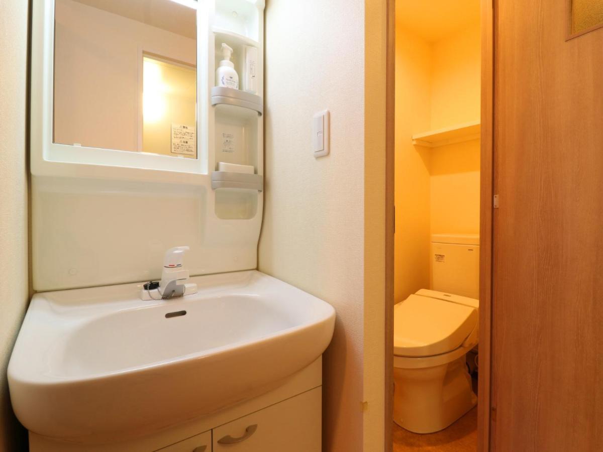 Hotel Asahi Grandeur Fuchu Bagian luar foto