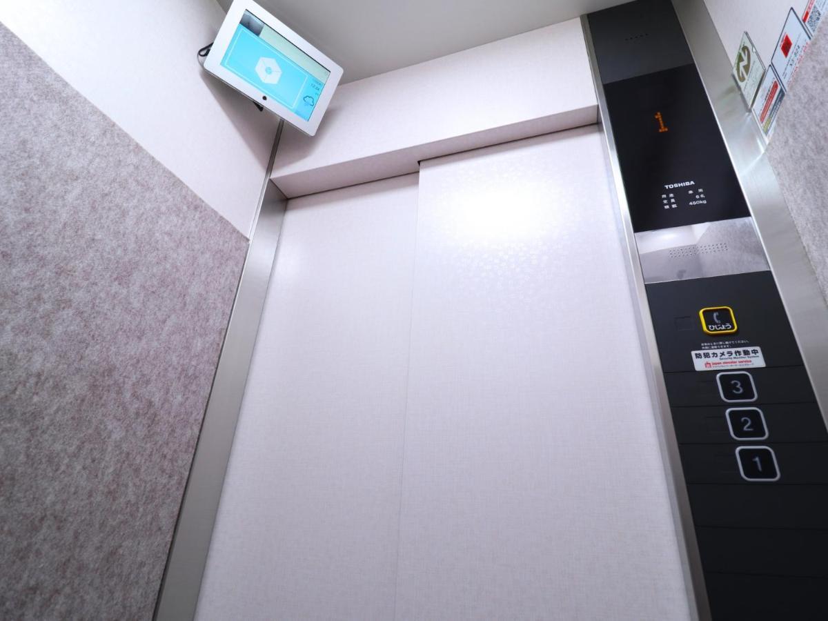 Hotel Asahi Grandeur Fuchu Bagian luar foto