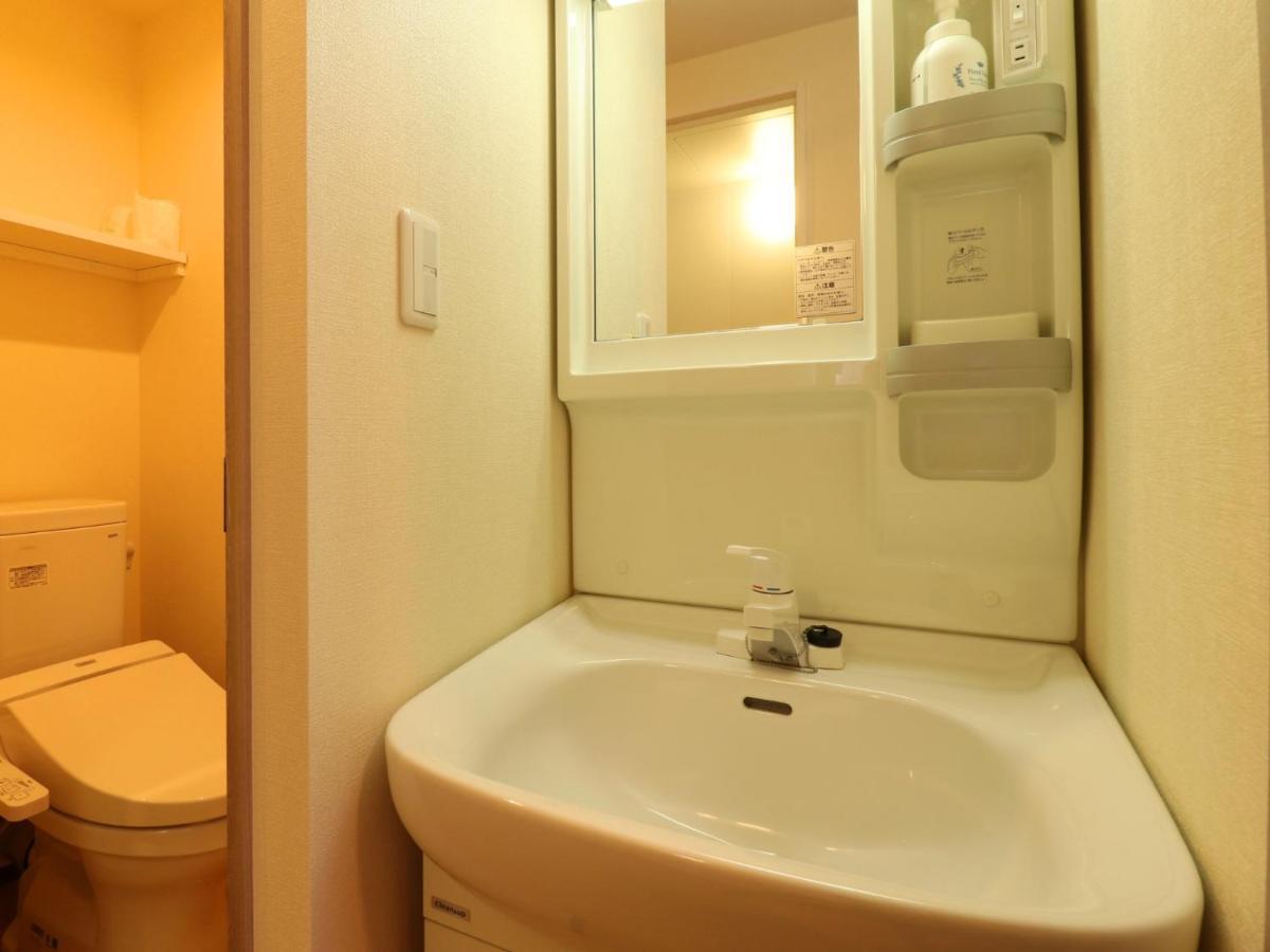 Hotel Asahi Grandeur Fuchu Bagian luar foto